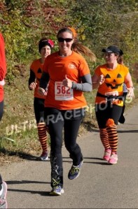 around mile 9, the two ladies behind me also have flowers on, they passed me after a bit!